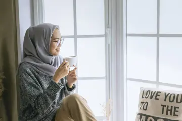 Woman Drinking Tea