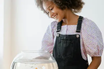 Girl Feeding Fish