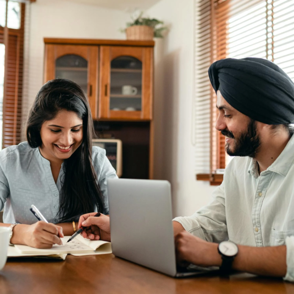 Couple Looking At Laptop