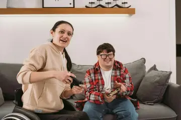 Woman And Boy Playing Video Games