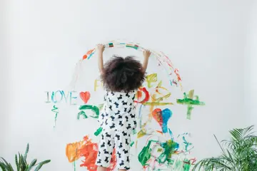 Child Painting Wall